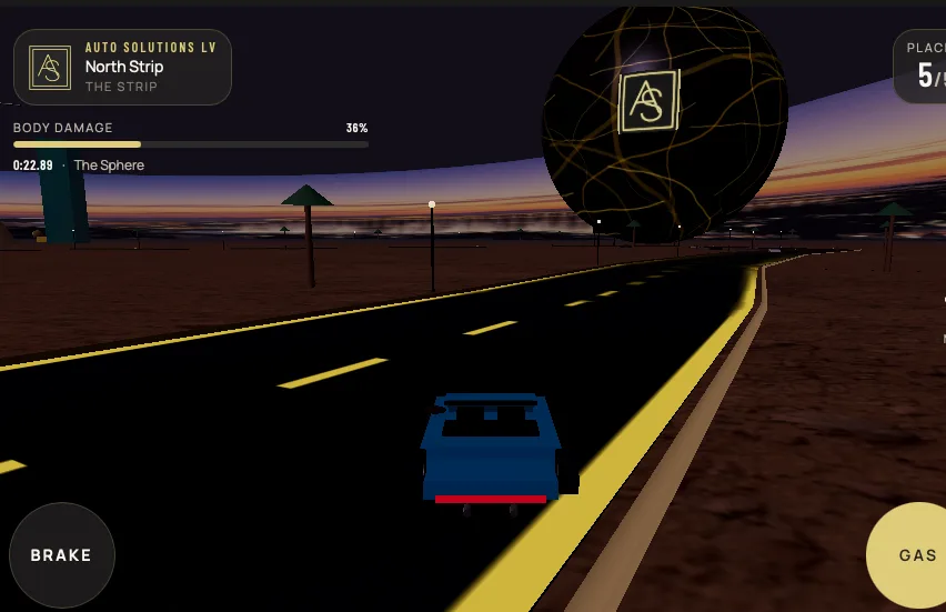 Blue car racing toward the Las Vegas Sphere displaying the Auto Solutions logo in the custom game.