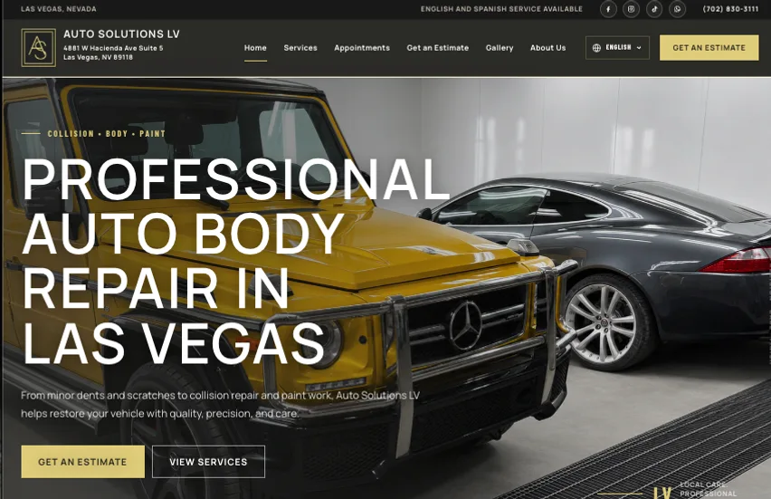 Auto Solutions LV homepage showing a yellow Mercedes SUV and a dark coupe inside the auto body shop.